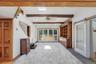 Family Room with sliding glass doors leading to back deck with hot tub and outdoor shower.
