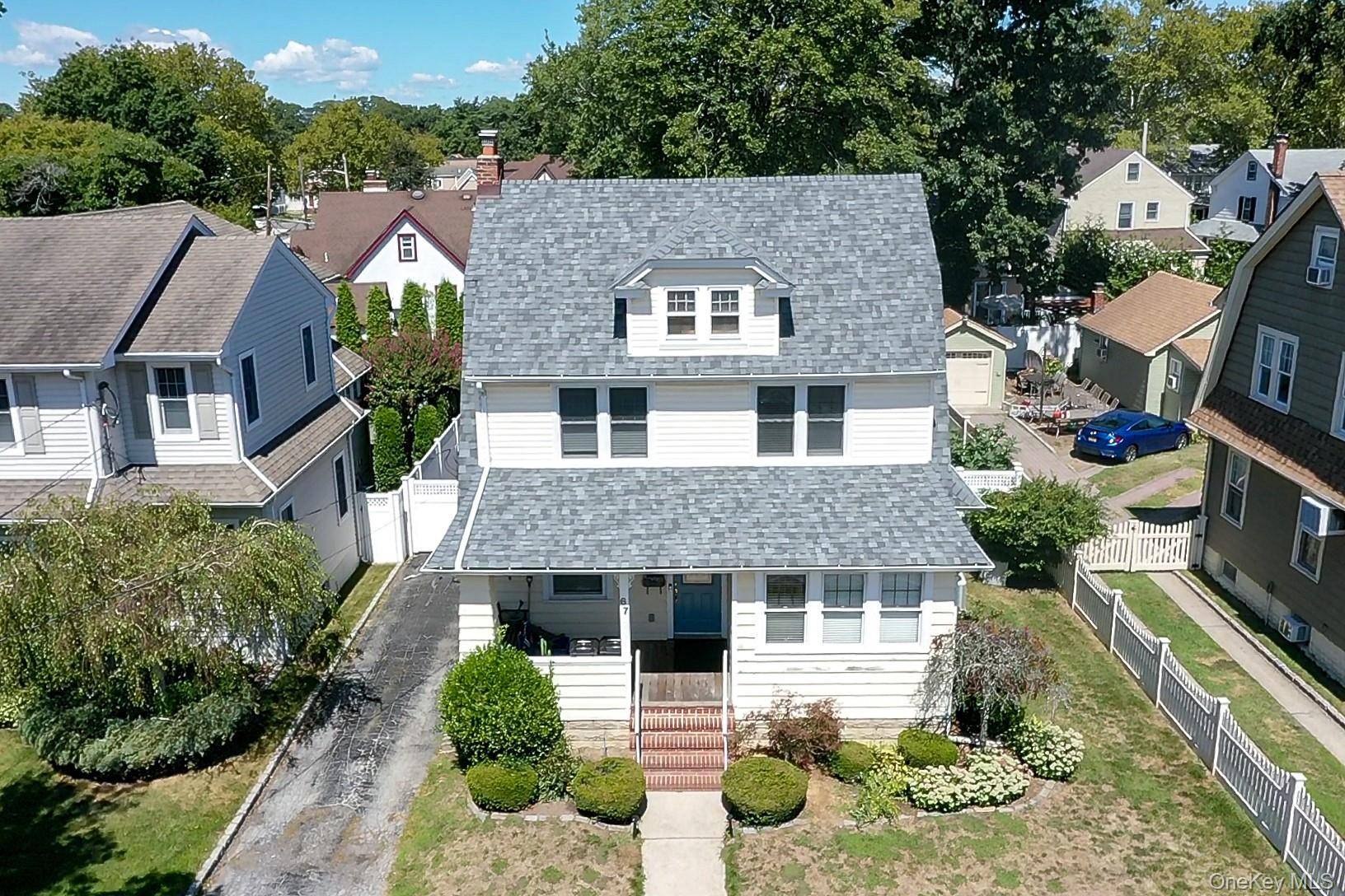Welcome to this charming colonial home located in the picturesque Village of North Lynbrook.