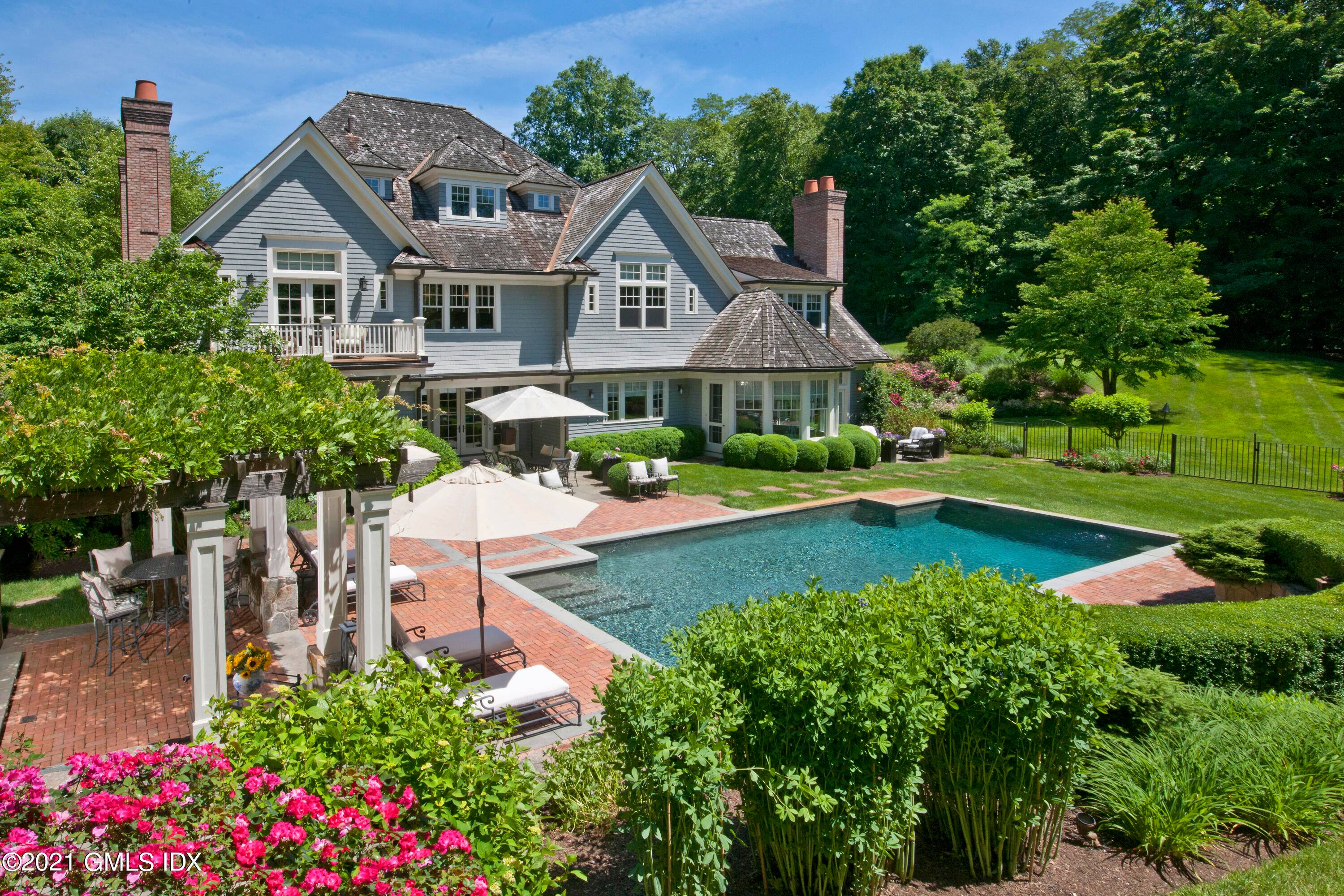 Better than new ! Magnificent 6 bedroom stone shingle Colonial by famed Granoff Architects sited on a private 4.