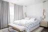 Bedroom featuring wood finished floors.