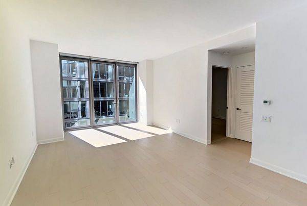 Spacious one bedroom featuring a flexible layout with space for a dedicate dining or home office nook, gourmet kitchen with stainless steel appliances, quartz countertops and eating bar, an in ...