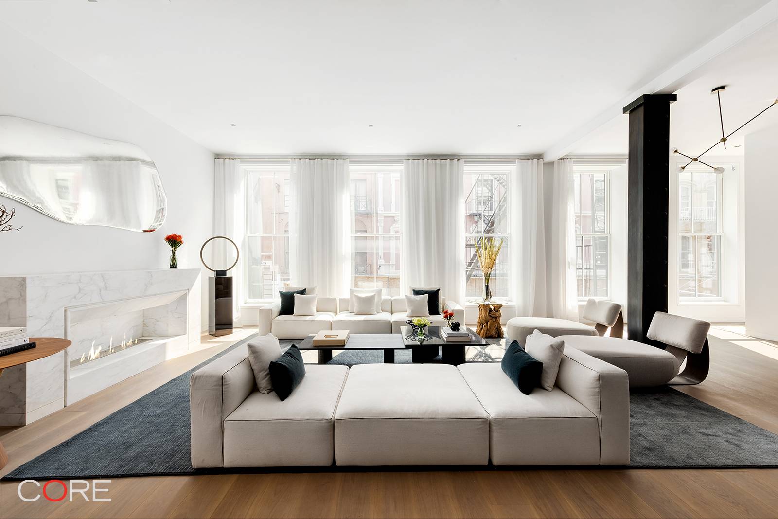 Nearly 50 feet wide, 49 Greene presents three full floor residences and one triplex penthouse in the heart of SoHo's Cast Iron Historic District.