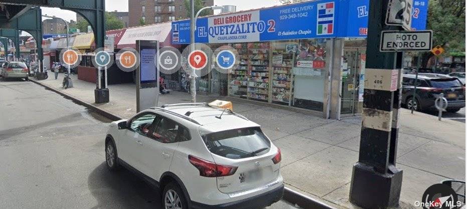COMMERCIAL BUILDING WITH 12 STORES FRONT FOR SALE ON ROOSEVELT AVE.