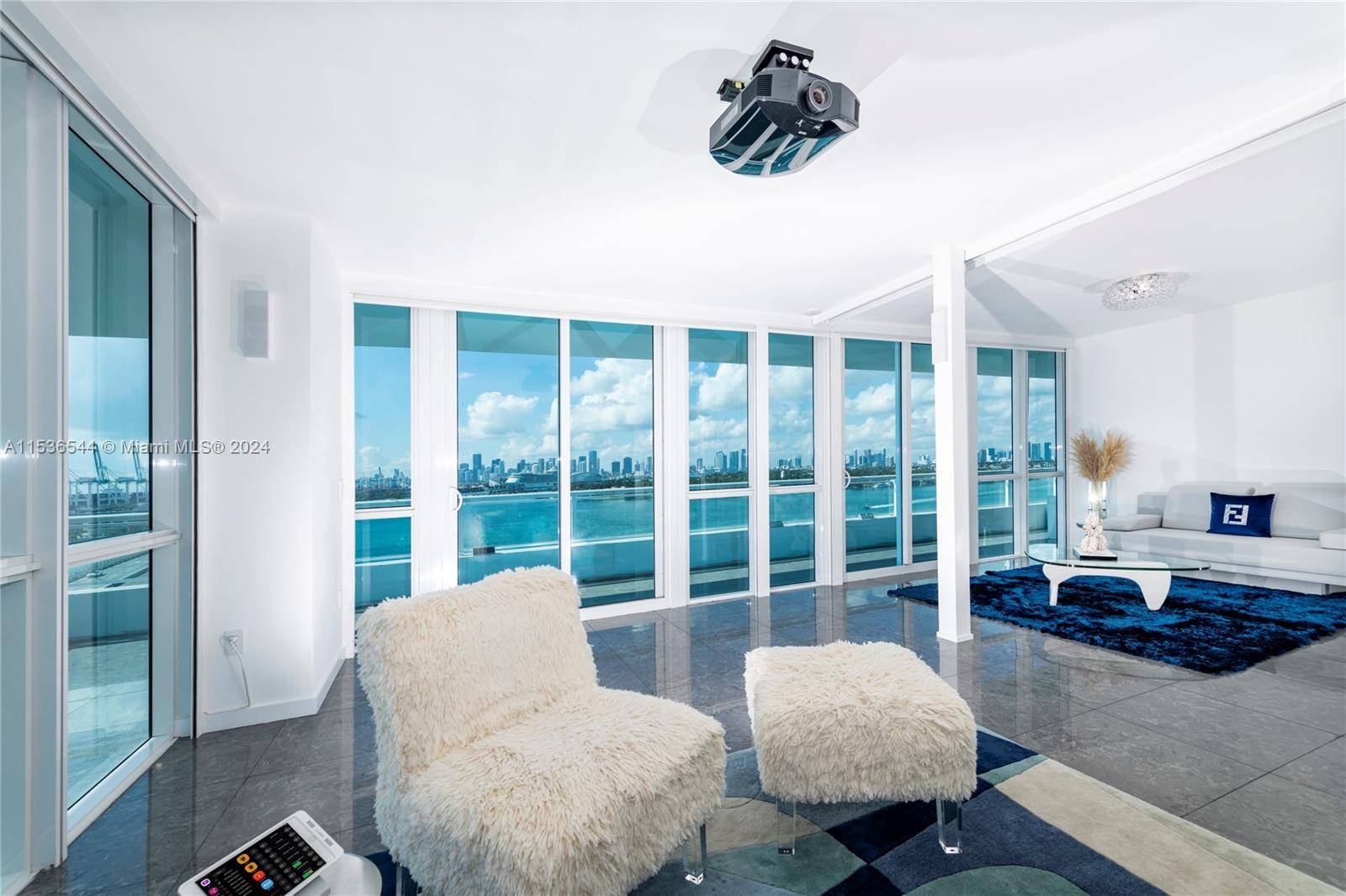 This open floor plan house in the sky located in the heart of south beach offers panoramic 120 wraparound views of the ocean, Miami skyline at the prestigious Bentley bay ...
