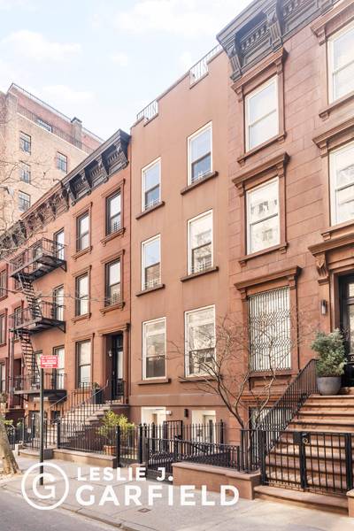 Conveniently located in New York City's Turtle Bay 216 East 50th Street is a newly constructed 4 story brownstone townhouse plus finished basement.