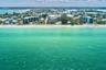 Clear calm teal Gulf water on IndianRocks Beach looking East over Intracoastal Waterway.