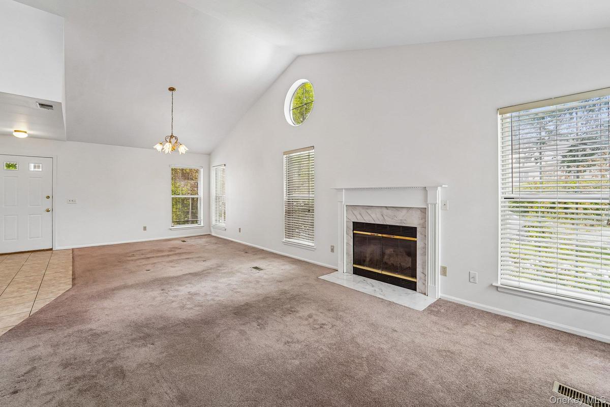 With wood burning fireplace.