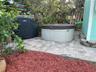 Home features a large Weber gas grill and a 5 seat hot tub! Fire up the grill for a delicious meal, then unwind in the hot tub while enjoying the leis