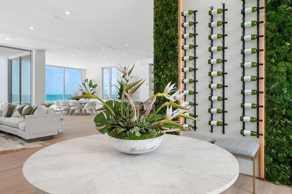 Biophyllic green wall greets you off the elevator as you enter the second floor