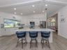This large modern kitchen is the heart of this home