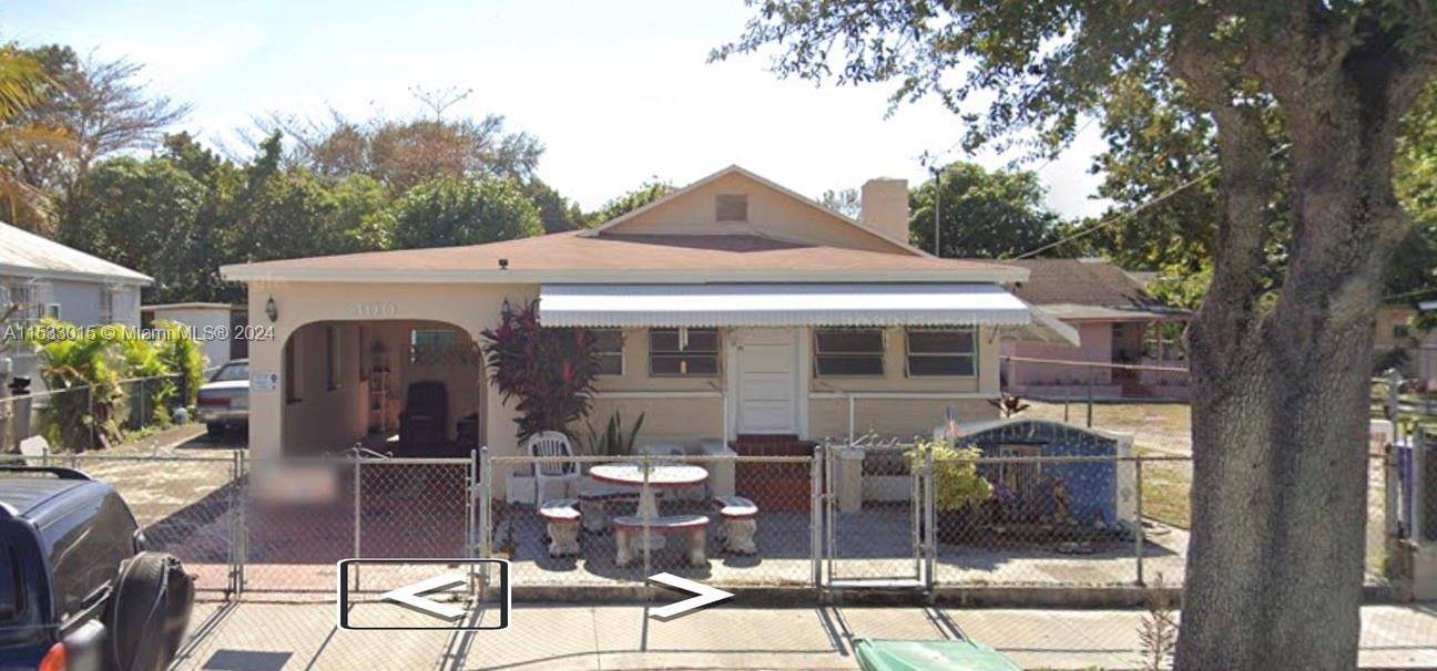 Single Family Home with carport on a sizable 8, 150 square foot Lot zoned Multi family in the heart of Miami's vibrant Wynwood Norte.