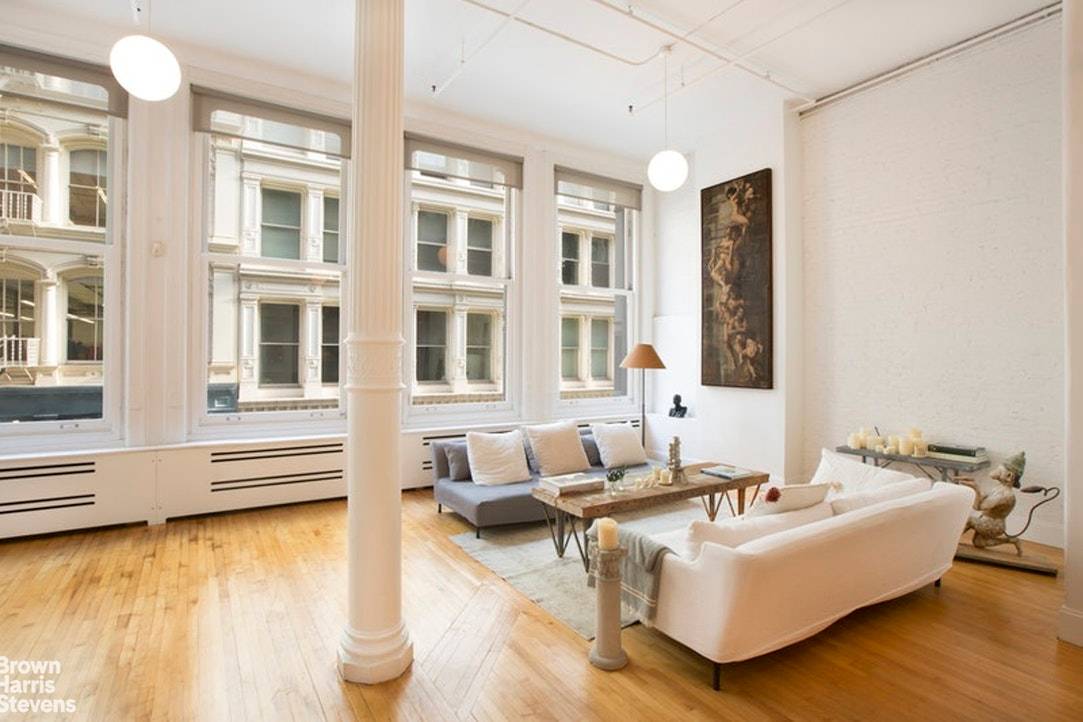 Beautifully renovated 3, 000SF loft in a classic 1882 cast iron building on the one of the most desirable blocks of the SoHo Gold Coast, Greene Street between Prince amp ...