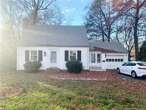 Charming Cape Cod style home with a cozy atmosphere, featuring two bedrooms and one bath.