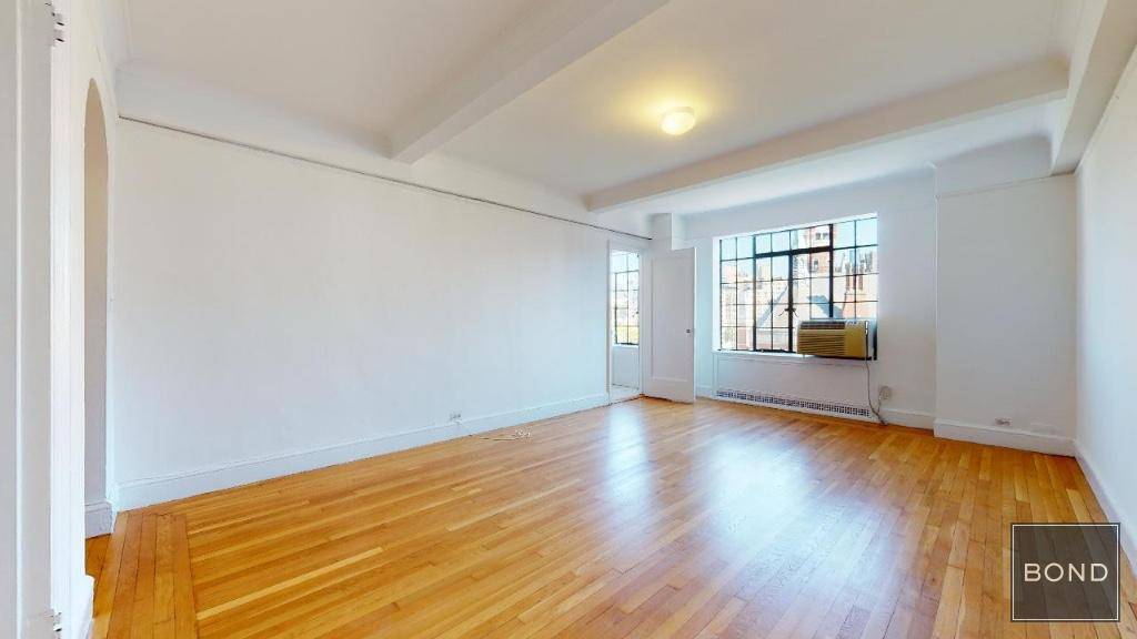 Massive studio in a well maintained doorman building in prime West Village !