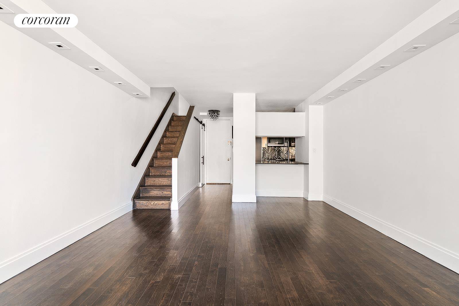 This spacious one bedroom Duplex has wood floors throughout, 12ft ceilings amp ; LED recessed lighting with dimmers.