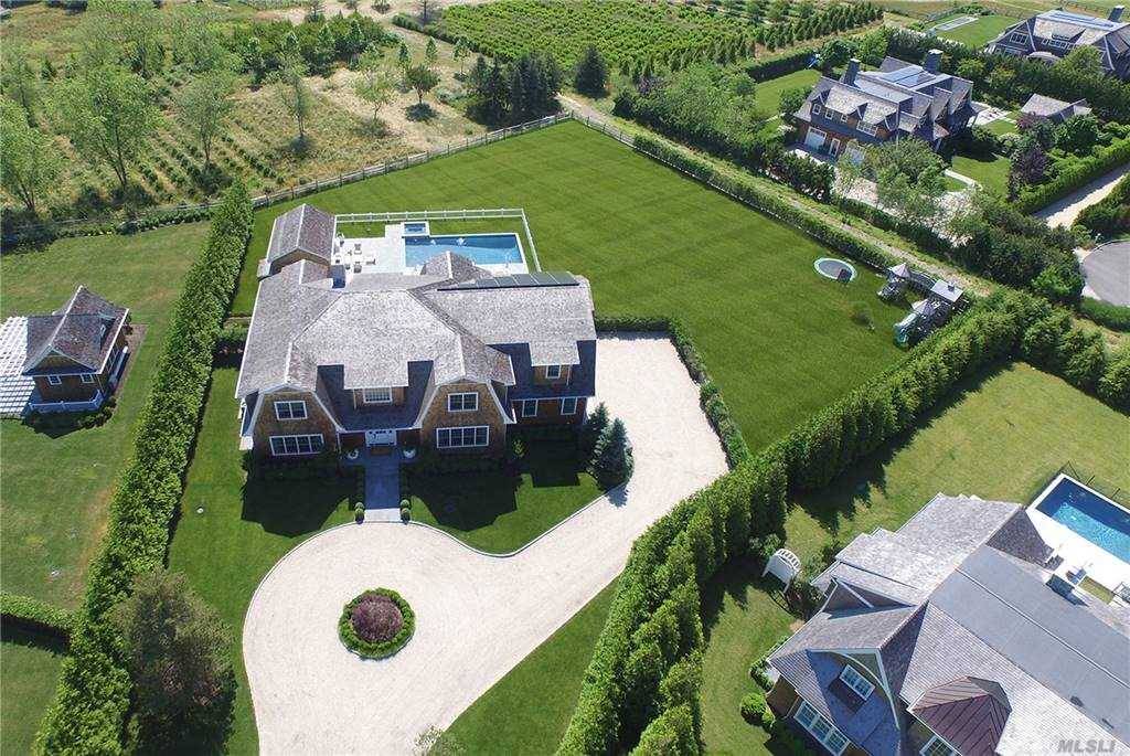 This elegant and top of the line designed beauty built by Bencar Building and custom Designed by Alex Papachristidis is centrally located in Water Mill farm land with spectacular views ...