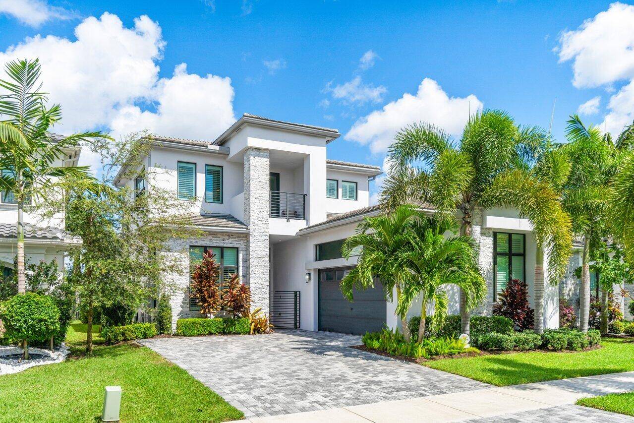 Welcome to this rarely available Vienna Grande Contemporary lakefront home located in Boca Bridges, one of Boca Raton's most desirable neighborhoods.