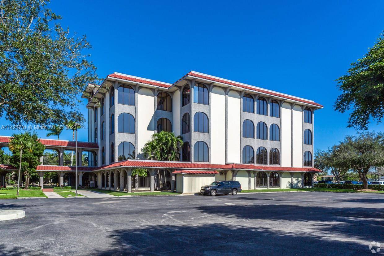 The listing features an expansive 4 story commercial building, in Homestead, FL, offering distinguished and historic architecture.