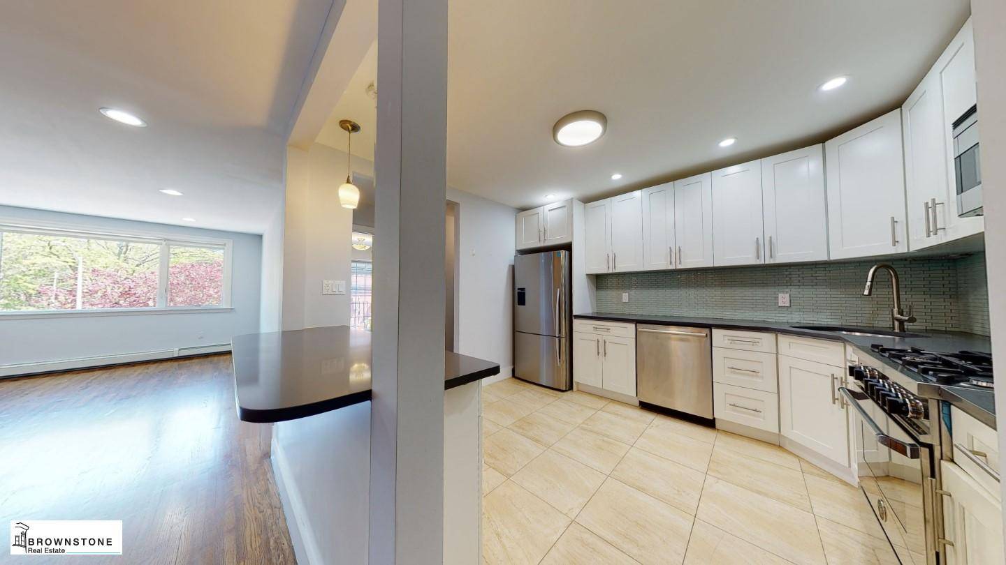 Your private entrance leads into a gorgeous recently renovated split level three bedroom, two bathroom apartment on historic Henry Street.