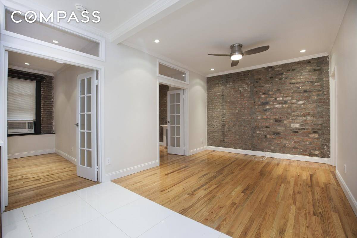 Amazing gut renovated True three bedroom two bathroom, boosts hardwood floors throughout with tons of modern finishes.