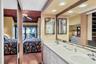 Primary Bath with Mirror Fronted Walk-In Closet & Dual Sinks