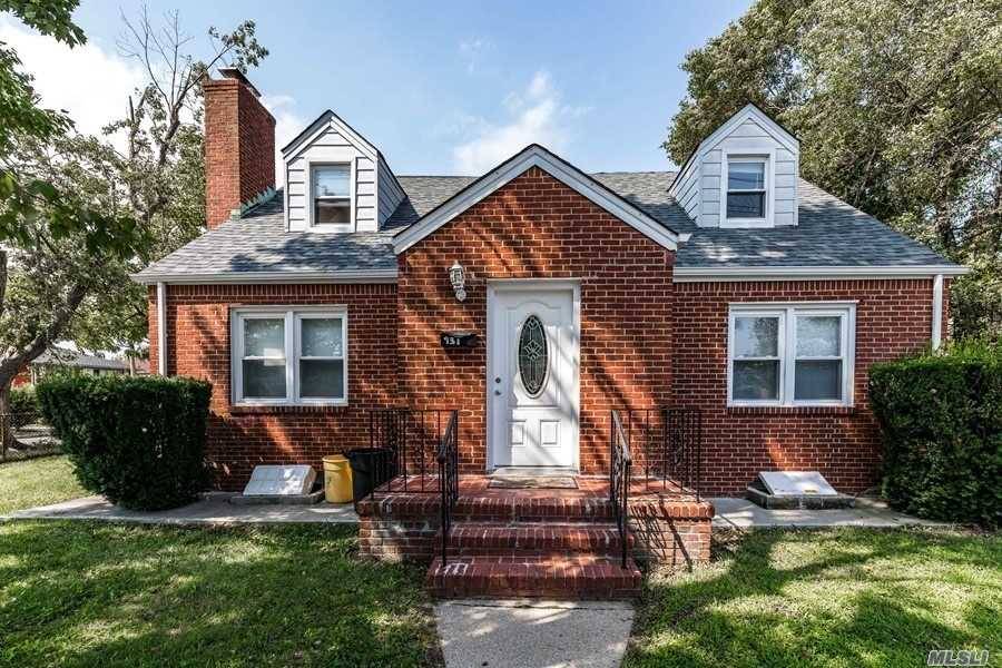Specious brick beautiful wide cape And feels like a Colonial.
