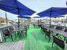 Wooden deck featuring a water view