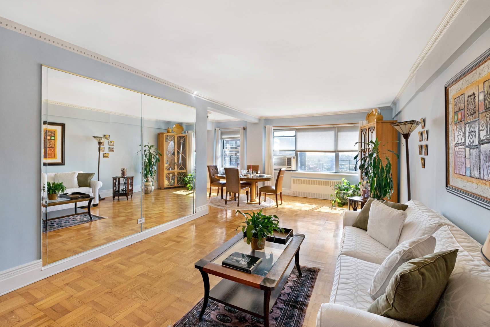 Live high above Riverdale in this top floor, corner 2 bedroom, 2 bathroom home at The Briarcliff.