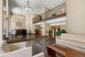 An inviting, beautifully maintained lobby welcomes residents and guests, with attentive doorman service and convenient access for packages and deliver