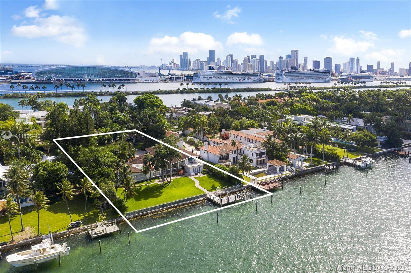 A rare opportunity on the Estate section of guard gated Palm Island with 150 linear wide Biscayne Bay waterfront.