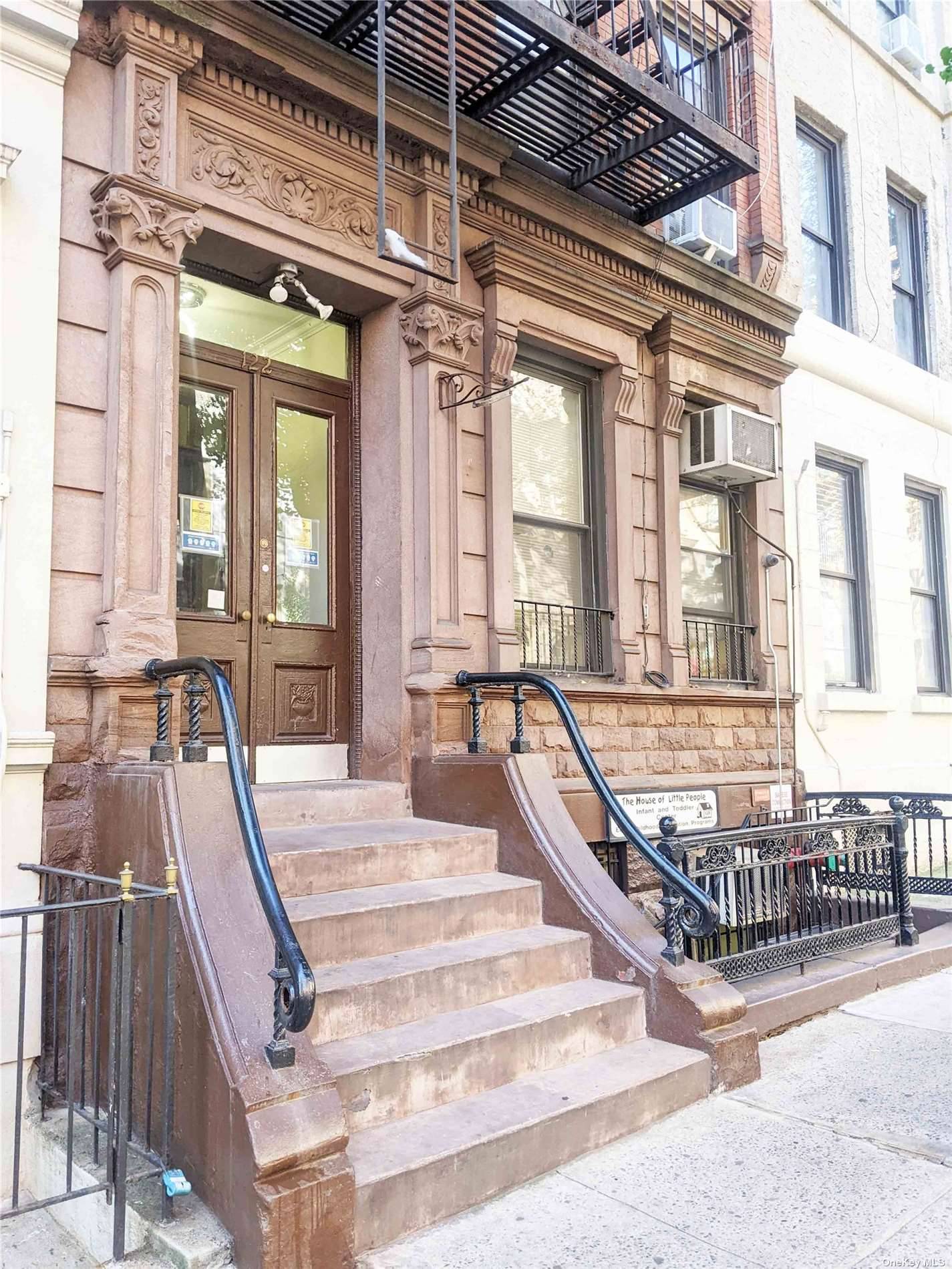 Charming Brownstone 5 story walk up building on 91st street offering the essence of Carnegie Hill.
