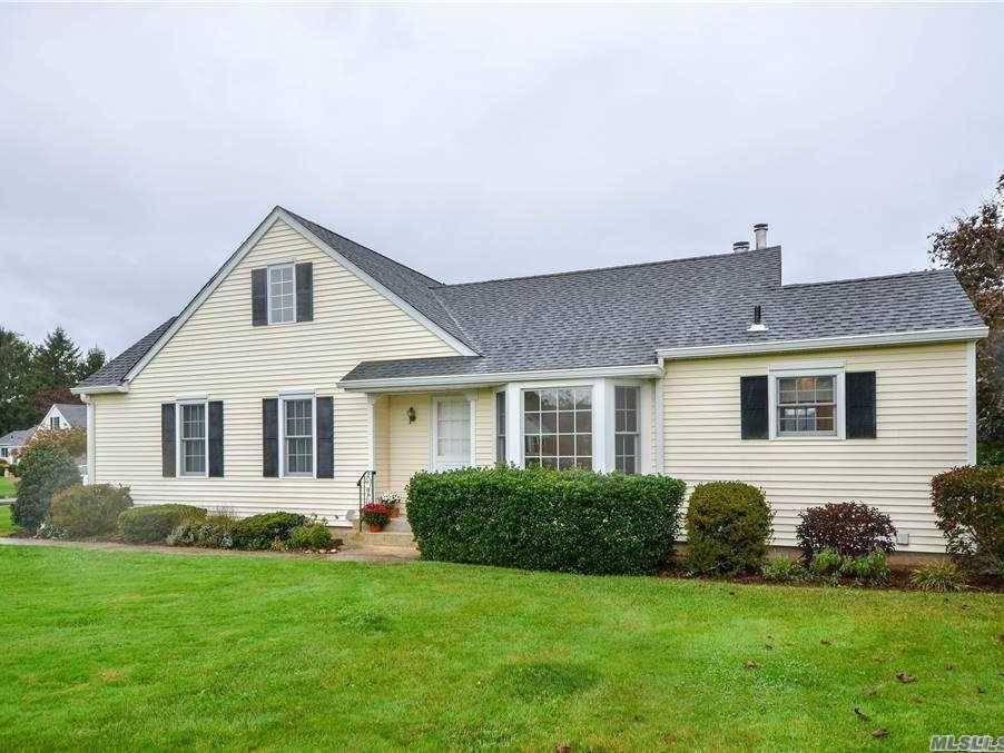 A beautiful and desirable end unit, located in the heart of Southold !