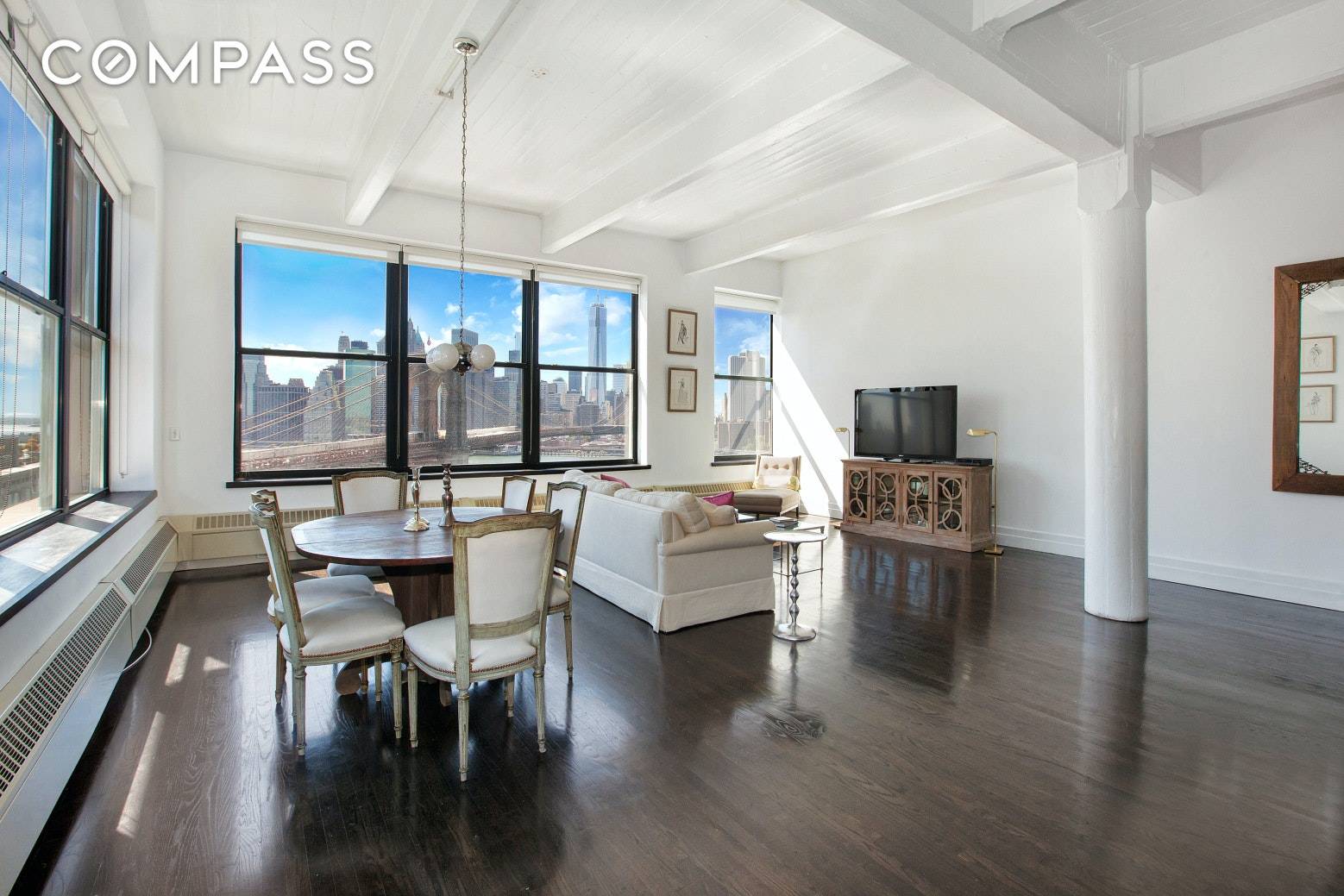 This beautiful open and airy space has unforgettable views of manhattan from the iconic Clocktower Condominium in DUMBO.