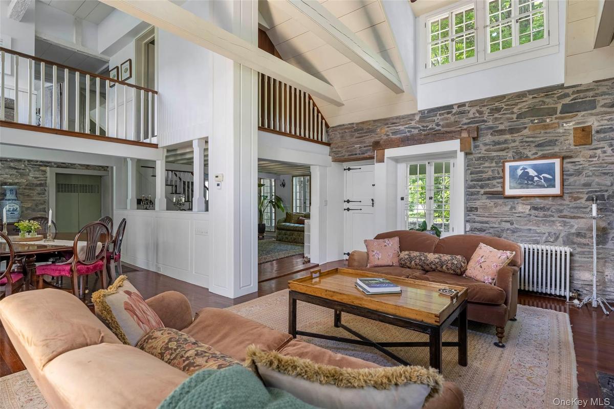 A dramatic living space with exceptional volume and timeless architectural character