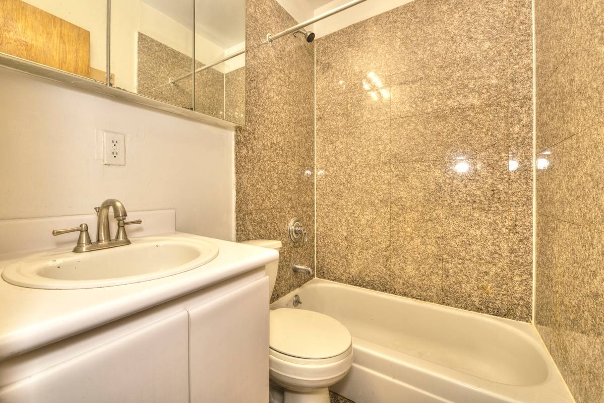 Beautiful renovated 3 Bedroom with laundry in unit in the heart of Little Italy, Manhattan.
