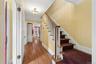 Front hall with classic staircase