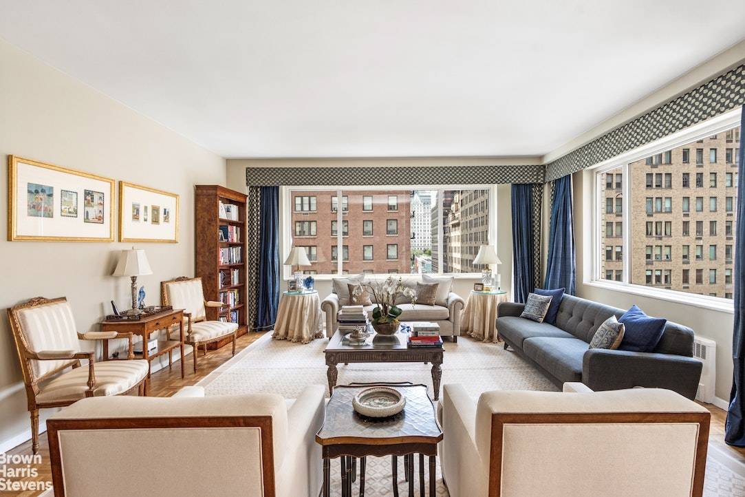 Grand corner residence with walls of windows and open views facing Park Avenue.