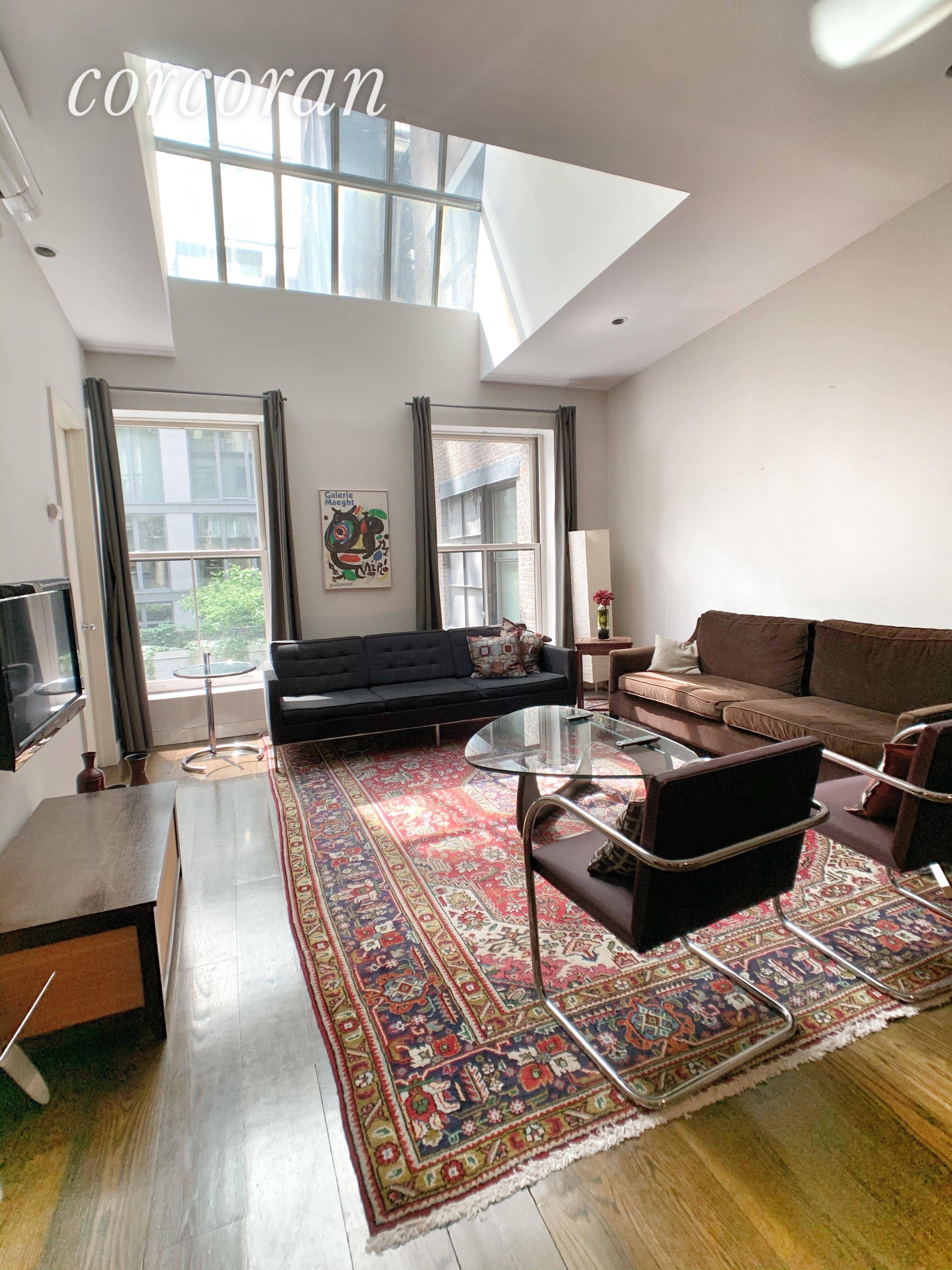 GIANT LOFT 1800SF THREE BED TWO BATH WITH HIGH CEILINGS AND SKYLIGHT !