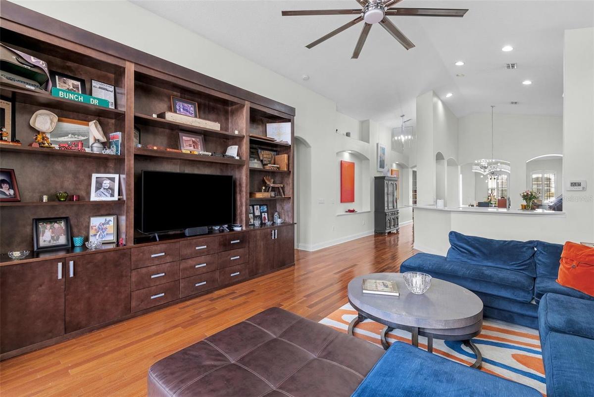 Family room flows easily into kitchen and dining areas.
