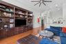 Family room flows easily into kitchen and dining areas.
