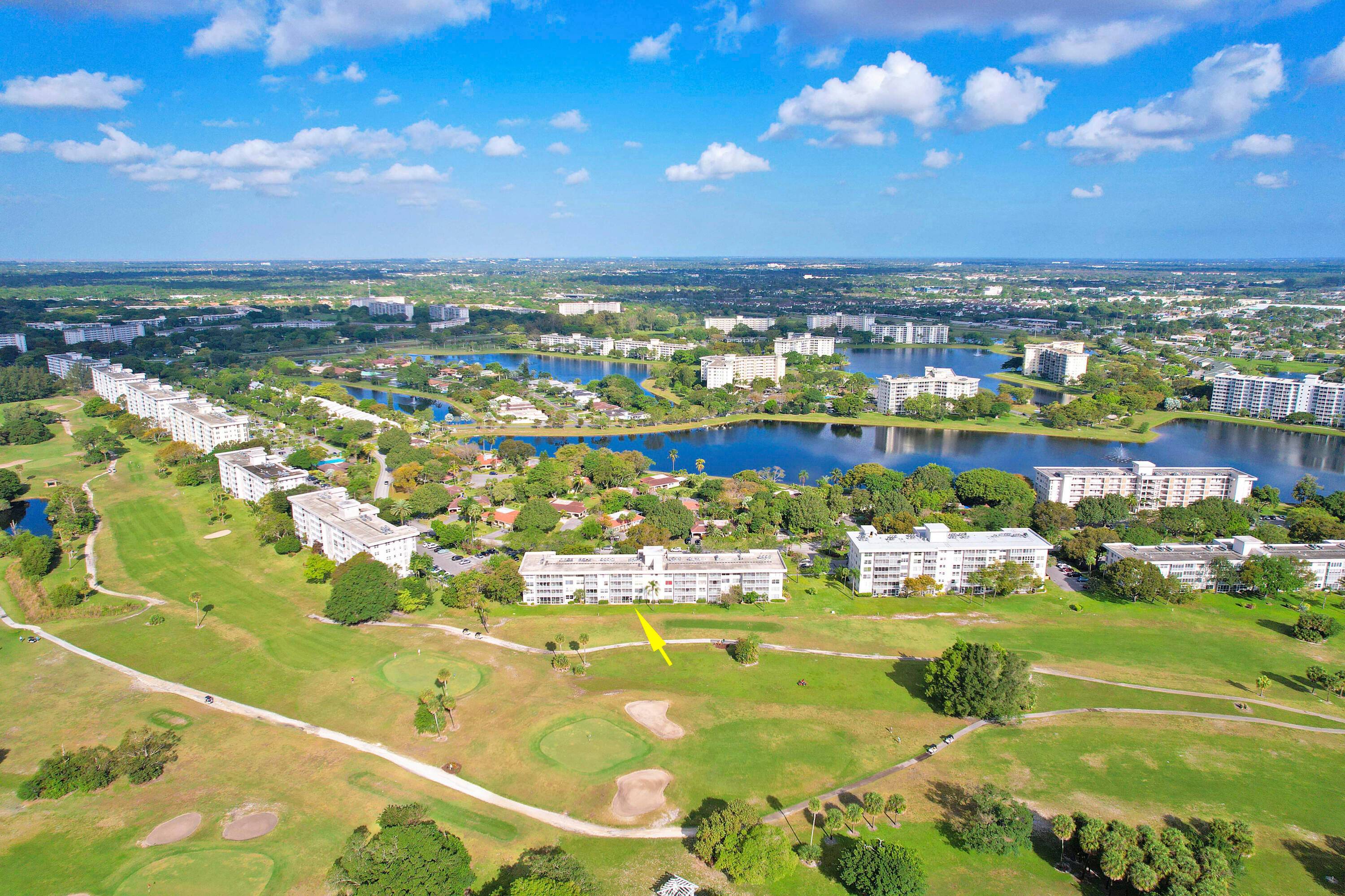 Welcome to your fully renovated 1st floor condo in Palm Aire, offering serene golf course views from a screened patio.