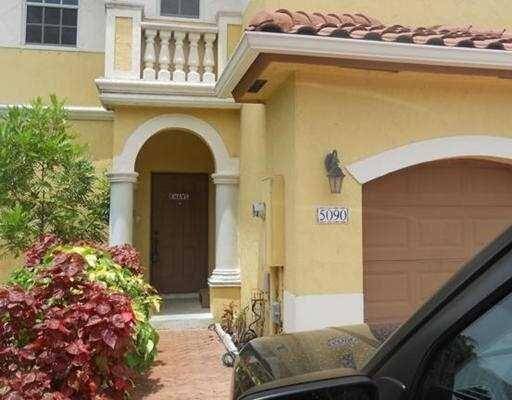 Fantastic Corner Lake View unit Townhouse in Gated Community 3 bedrooms, 2, 5 bathrooms, 1 car garage and very large private backyard.
