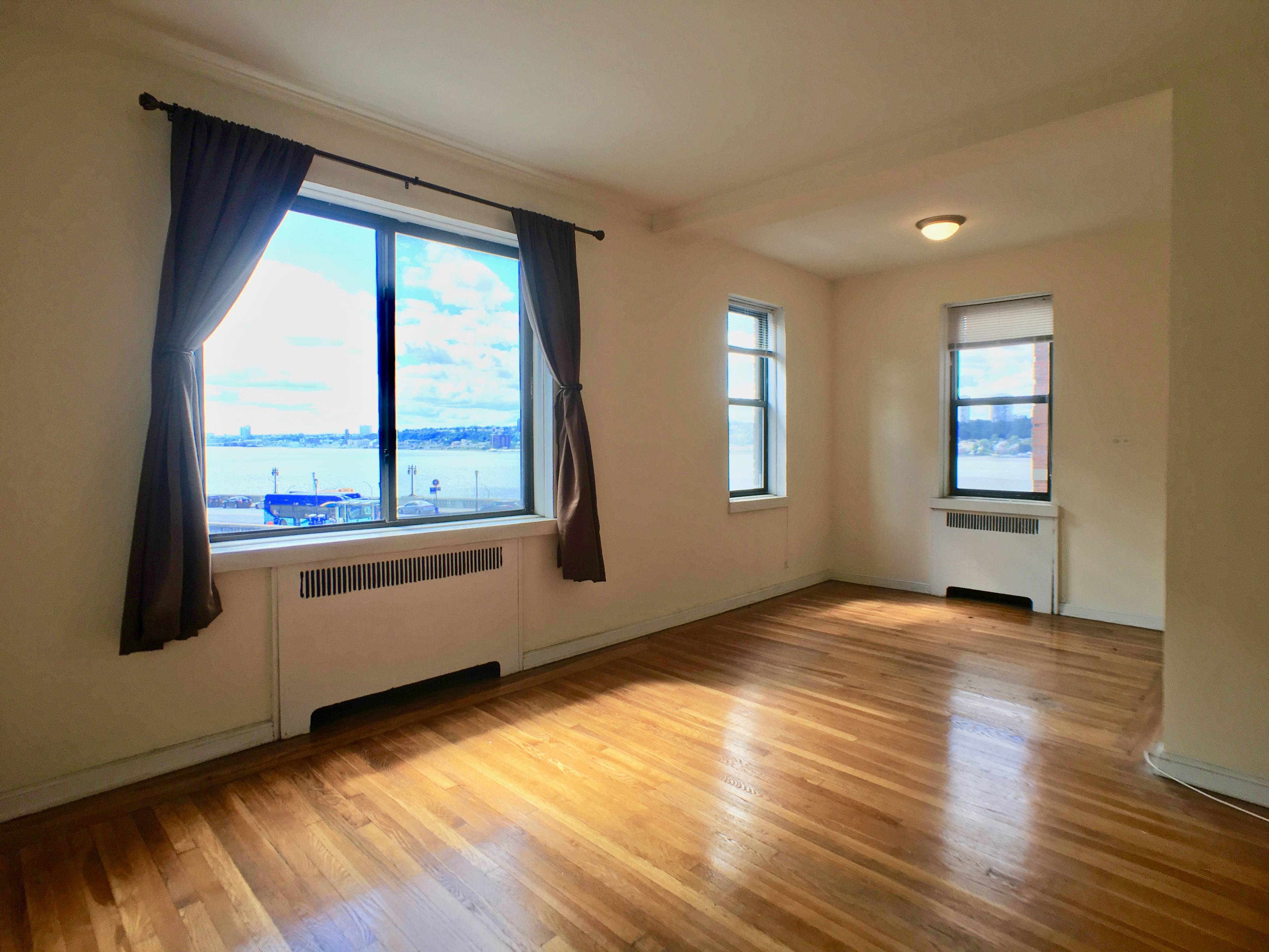 No Board Approval ! ! This remarkably spacious 1 bedroom apartment boasts tremendous views of the Hudson River from every single room.