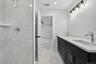 #5 Tiled shower walls and floors