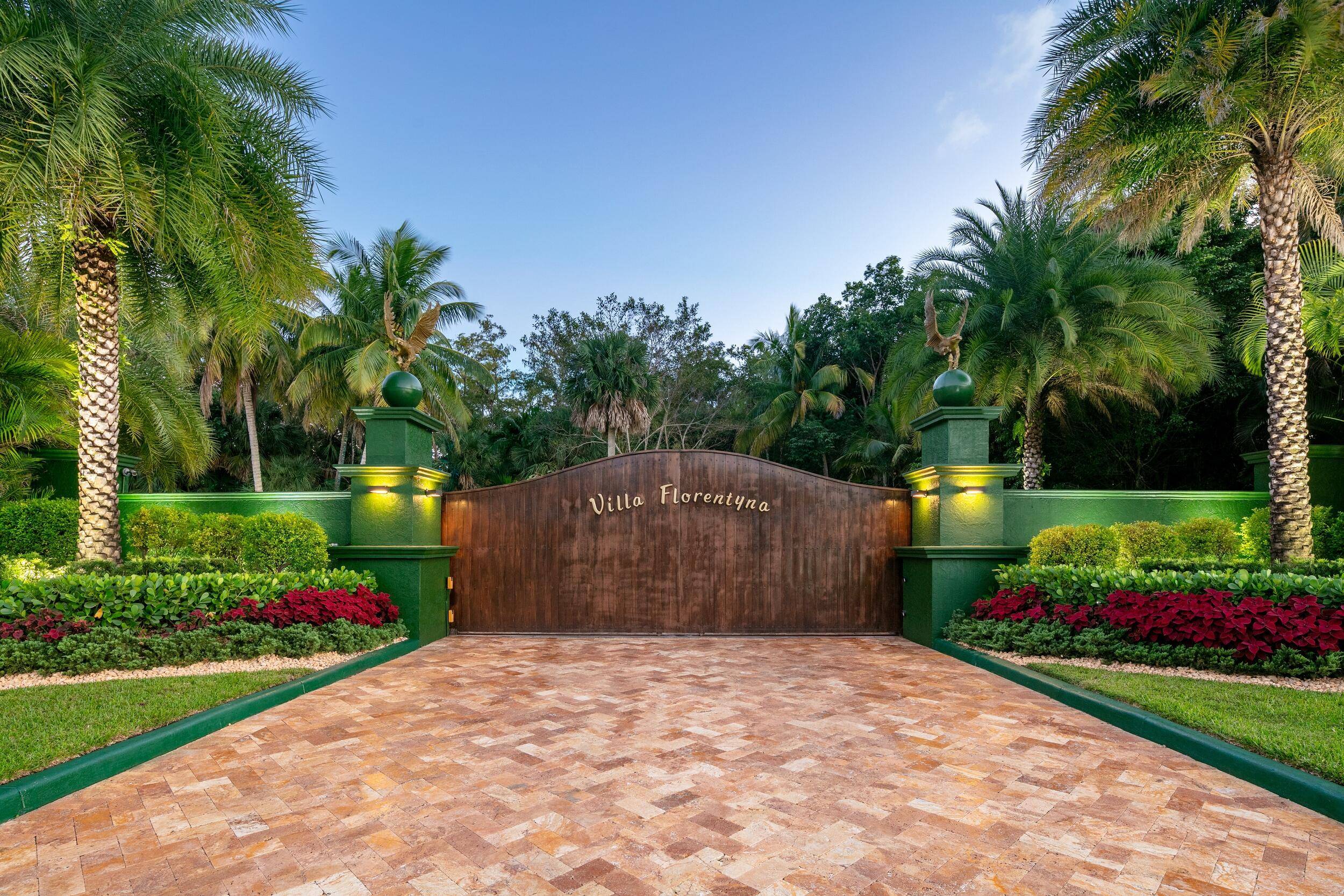Experience the ultimate in luxury and privacy at Villa Florentyna, a stunning trophy manor nestled in a private alcove in Boca Raton.