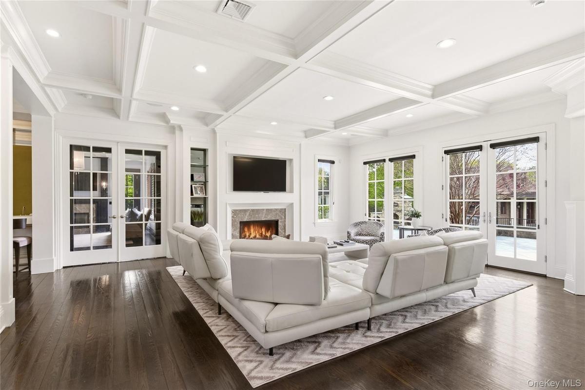 Den | Gas Fireplace | Hardwood Floors |Coffered Ceiling | French Doors