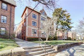 Elegant and charming pre war condo in beautiful 1920's brick building located in the heart of East Rock.