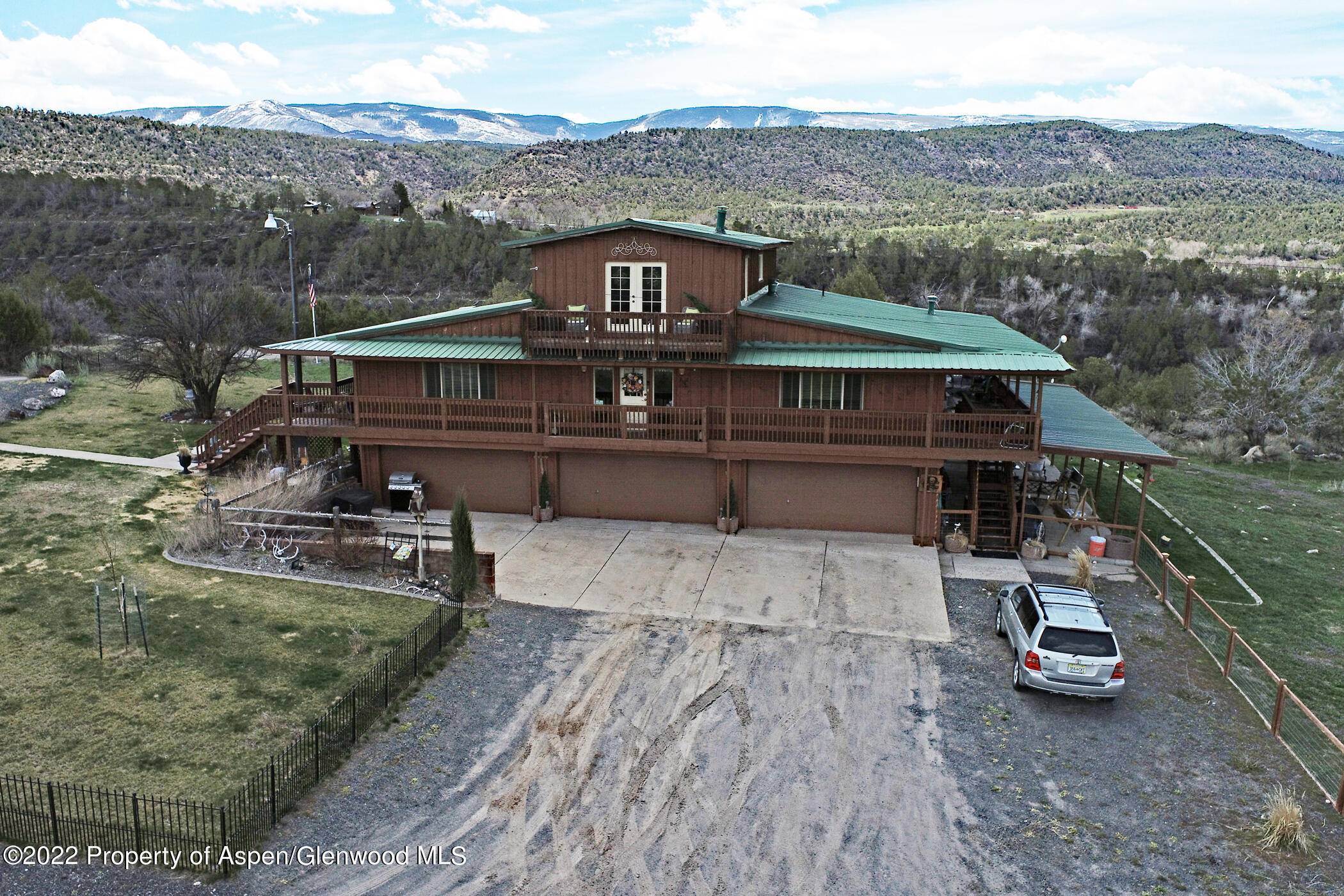 Stunning Colorado country home with many high end features surrounded by breathtaking mountain and valley views.