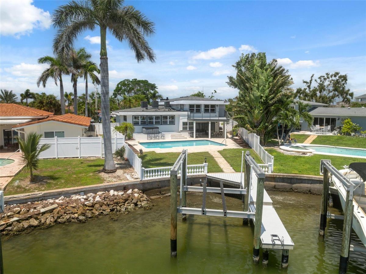 Boat lift & dock on the intracoastal, pool, views- this one has it all!