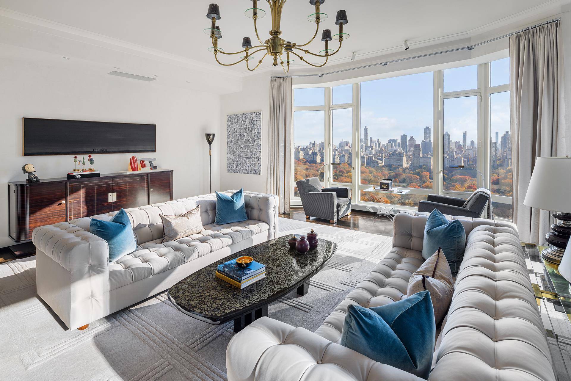 This residence at Fifteen Central Park West, a building that has redefined luxury in New York, features commanding views over Central Park from one of its highest floors.
